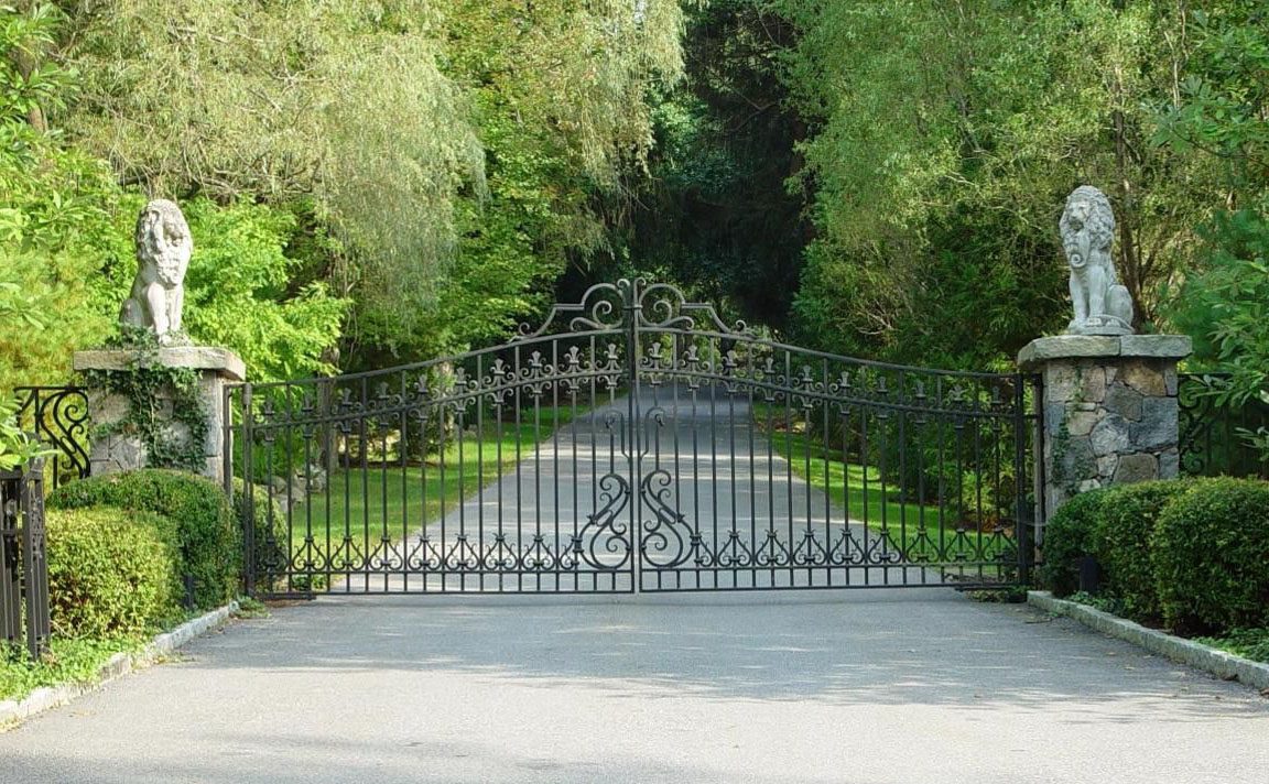 Iron driveway gate by Tri State Gate