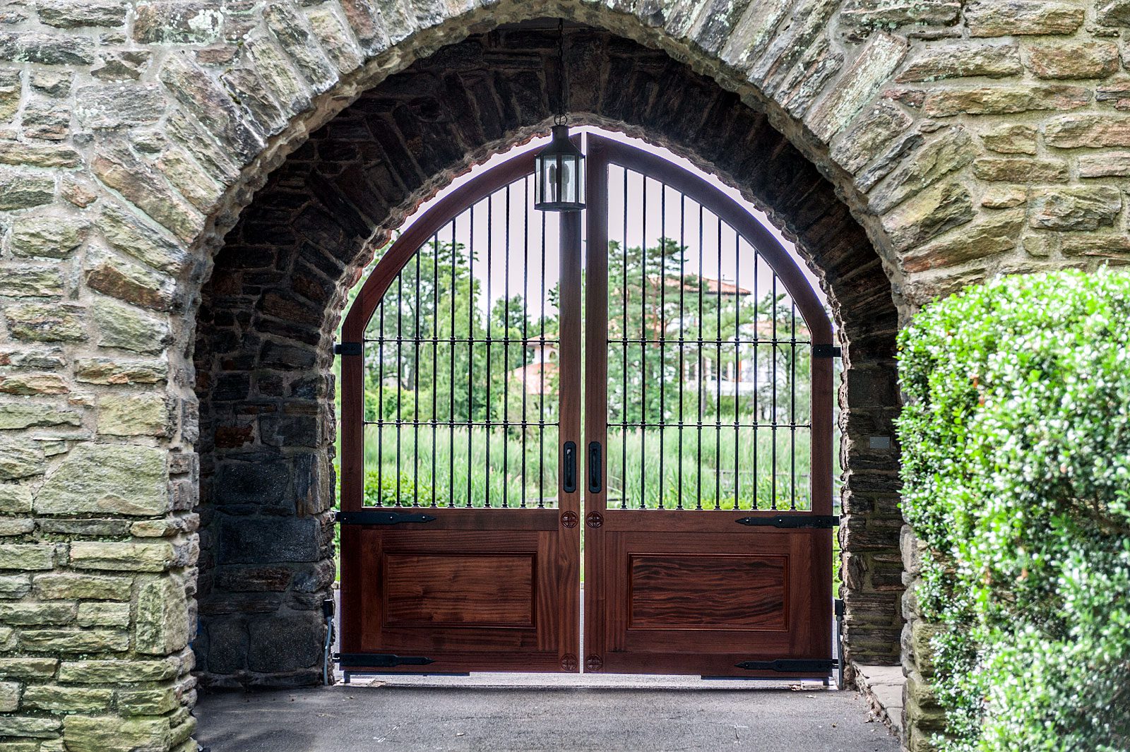 Gothic vestibule with wooden gate and stone wall