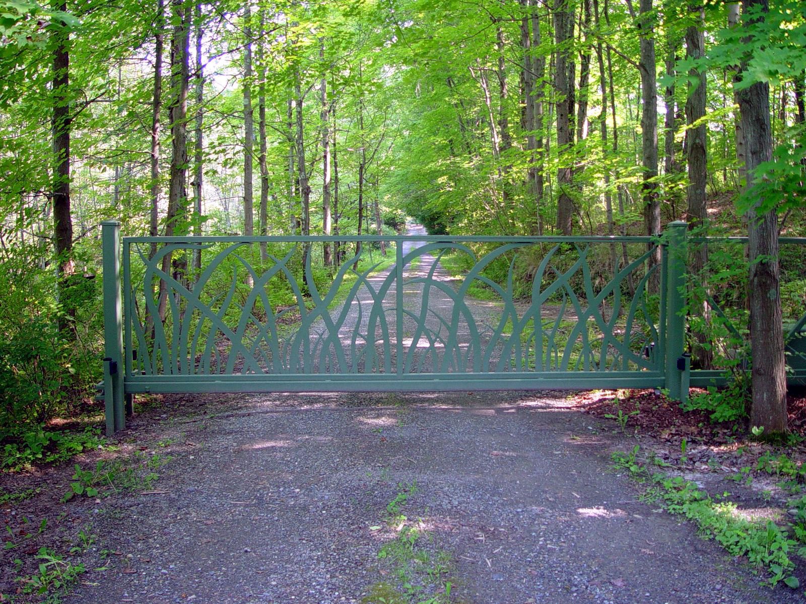 unique blades of grass pattern on metal drive gate