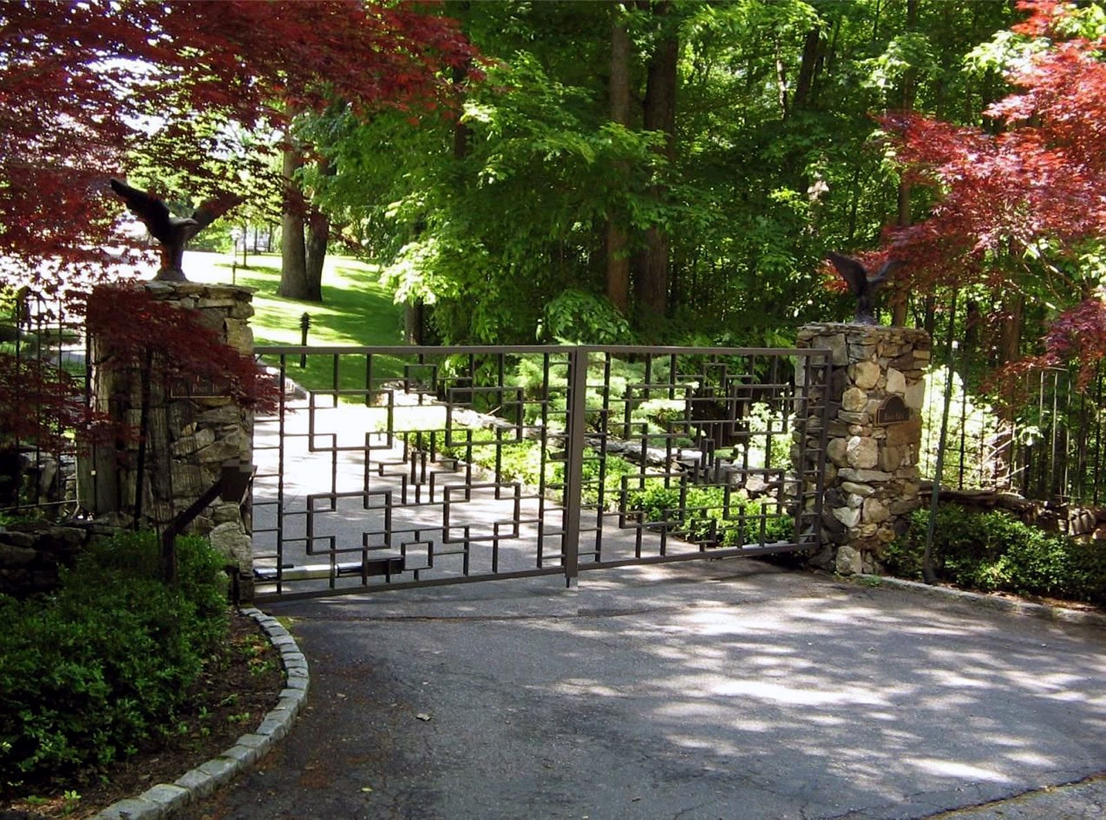 retro rectangular design on metal driveway gate