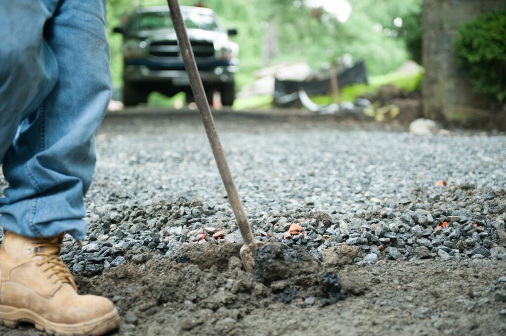 Tri State Gate Contractor Digging Posts