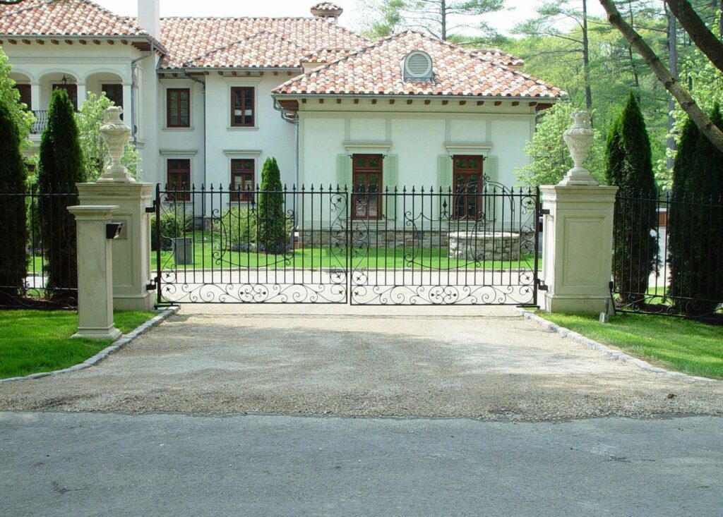 Concrete Pillars with Wrought Iron Residential Driveway Gate