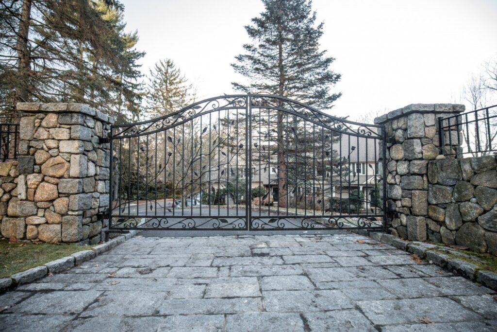 Natural Stone Pillars with Wrought Iron Gate