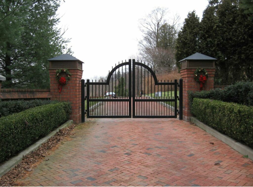 Wrought Iron Driveway Gate Decorated with Christmas Wreaths