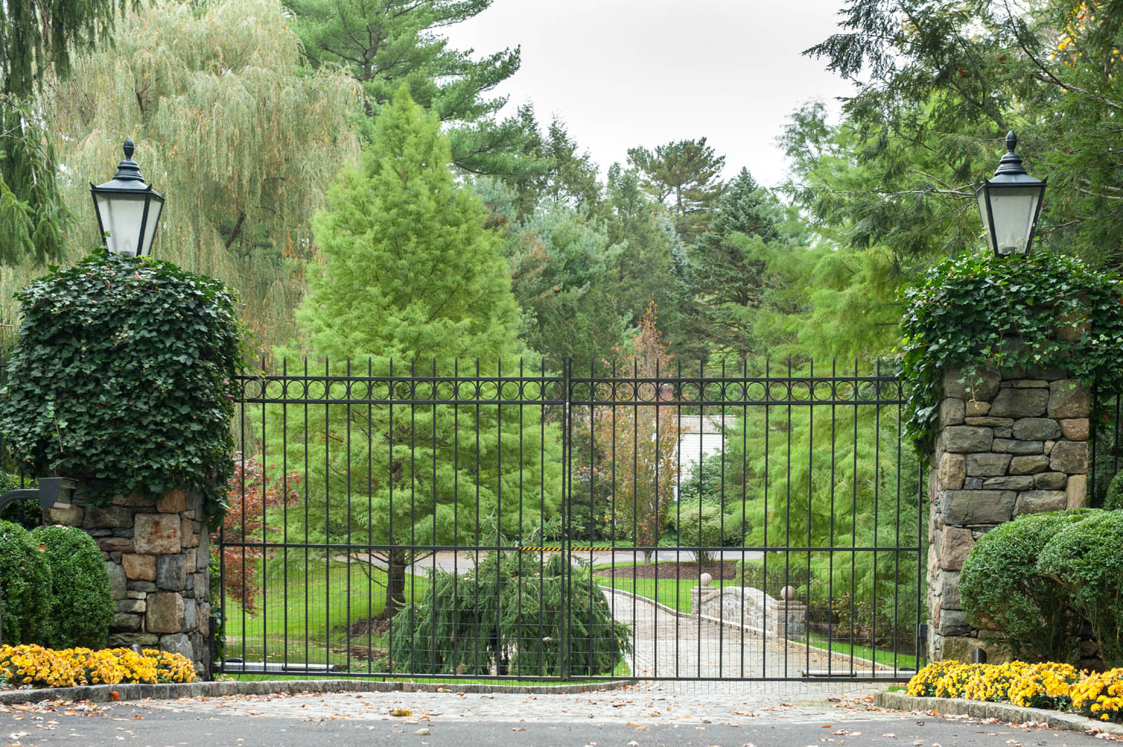 iron gate with lighting by Tri State Gate