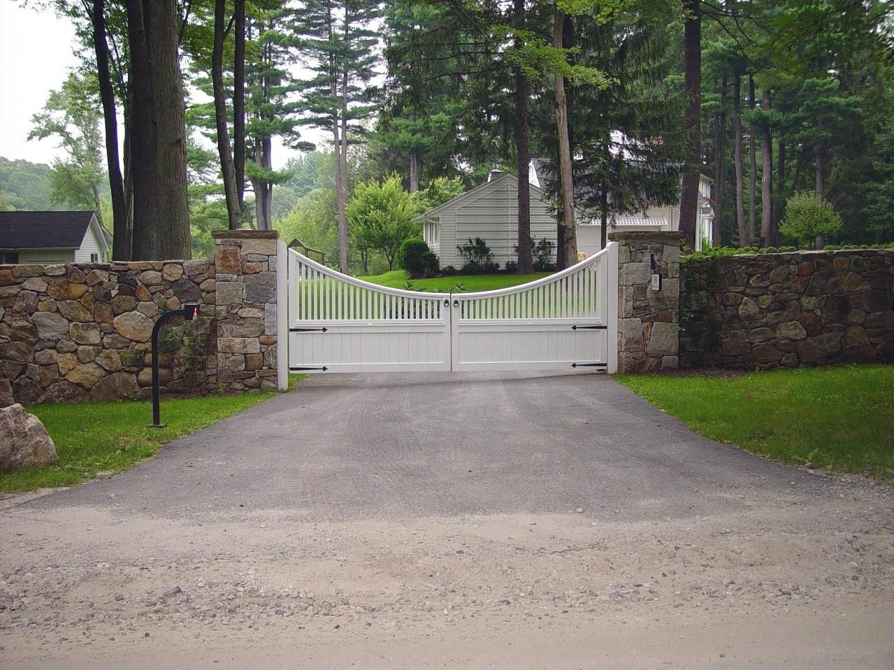 Scalloped wood picket driveway gate