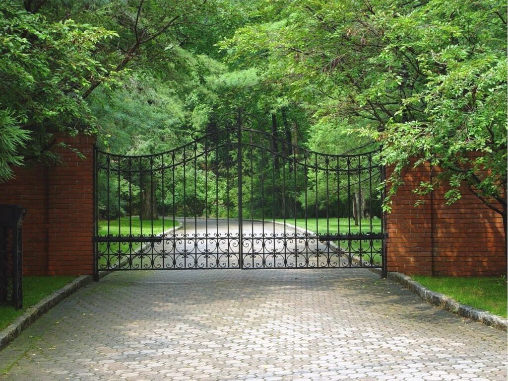 Metal Driveway Gate with Brick Fencing