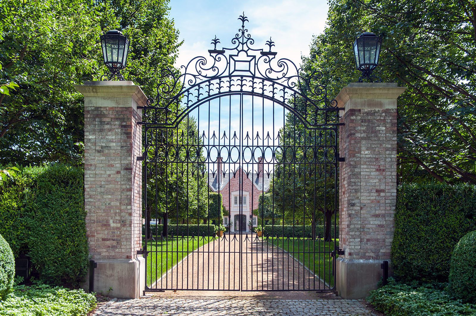 Tall gate on a narrow driveway