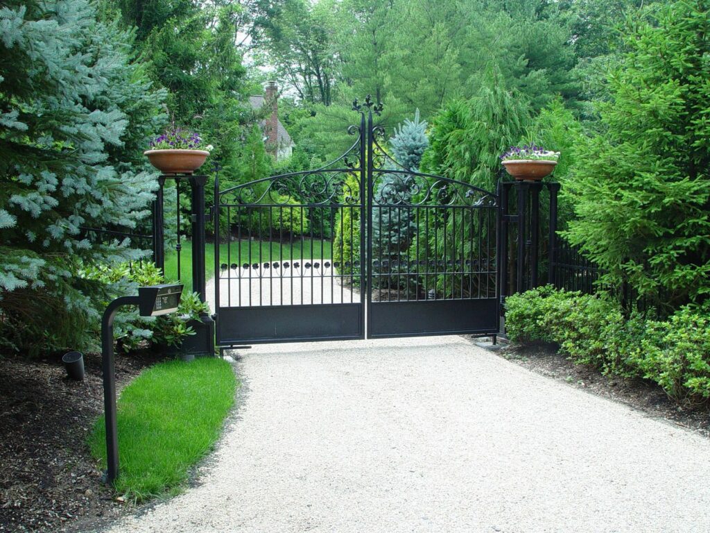 Custom Metal Driveway Gate Decorated with Planters