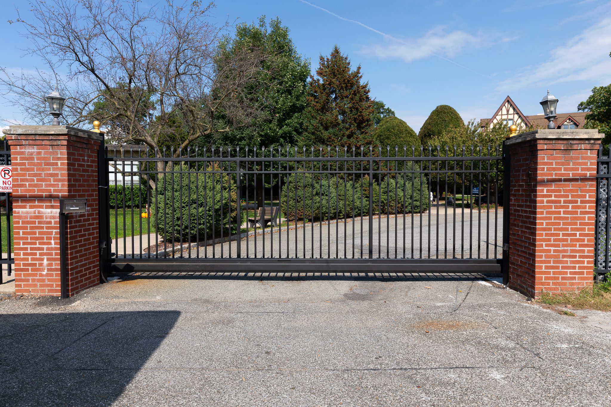 A traditional wrought iron sliding gate.