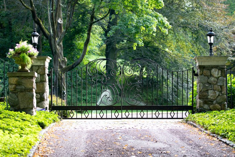 A Pattern of Swirling Metal Work on a Classically Inspired Gate.