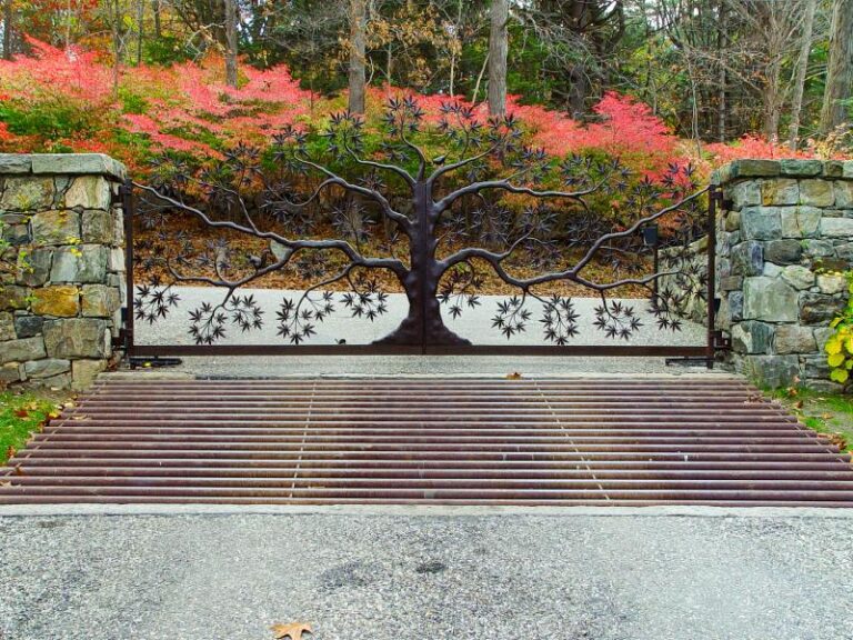 Metalwork Gate Designed To Resemble a Tree with Flowering Branches.