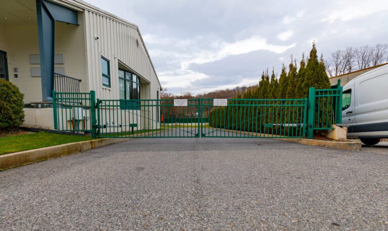 green metal commercial driveway gate
