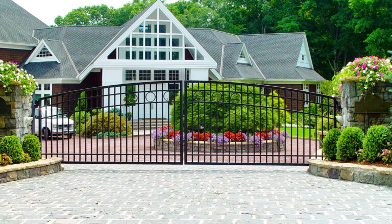 Simple metal gate in front of a house