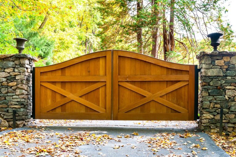 barn style arched wooden driveway gate