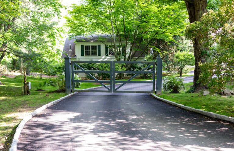 post rail inspired green farmhouse gate with mesh fencing