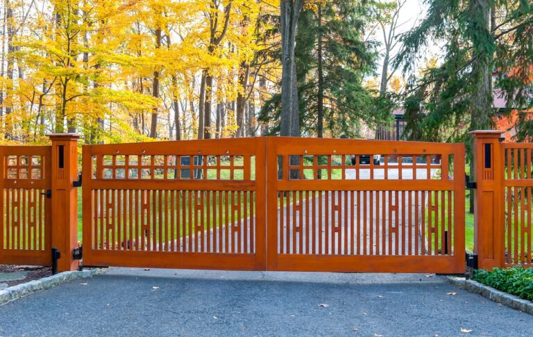 modern wood fence design with unique slats and lattice