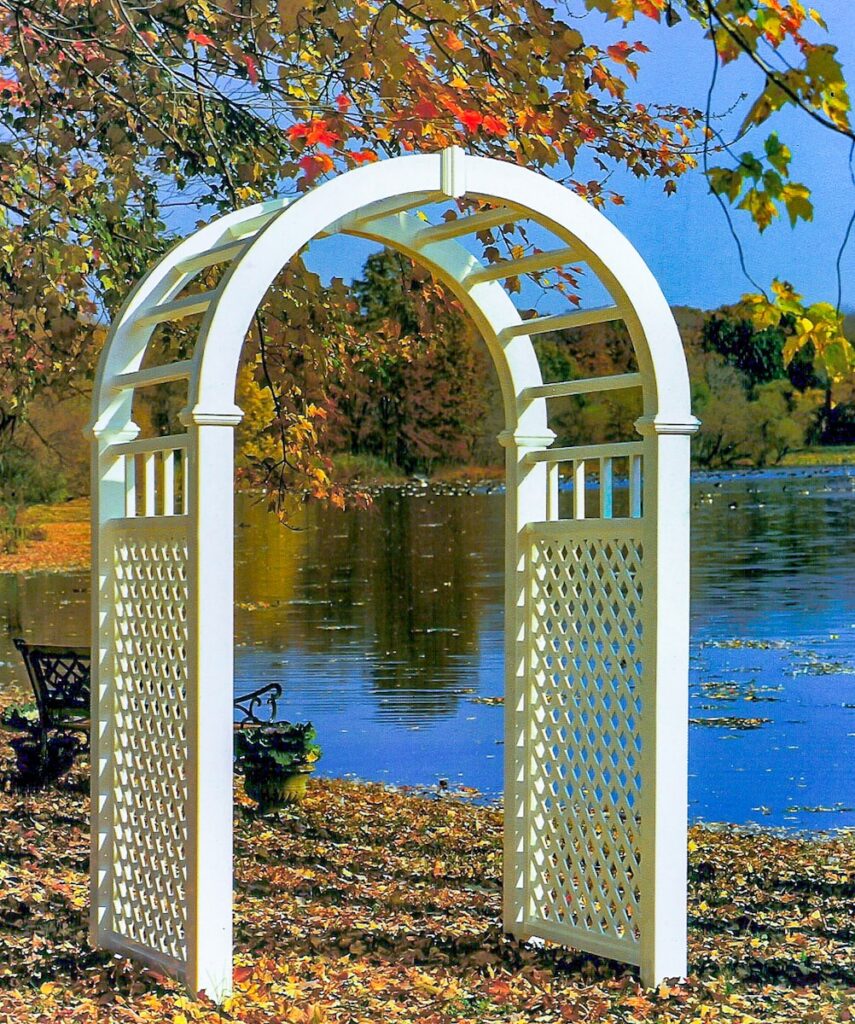 stand alone white arbor near lake